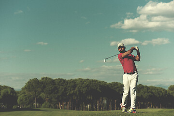 Image showing golf player hitting long shot