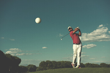 Image showing golf player hitting long shot