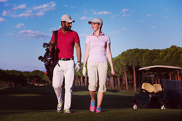 Image showing couple walking on golf course