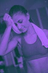 Image showing woman exercising on treadmill in gym