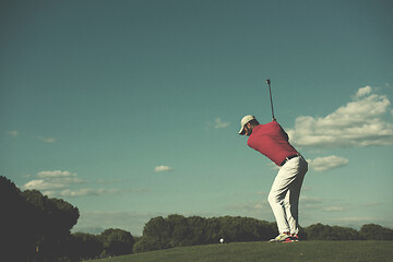 Image showing golf player hitting long shot