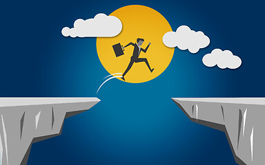 Image showing Jumping through mountain cliff to success