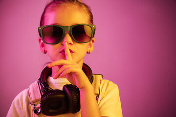 Image showing Young girl with headphones enjoying music