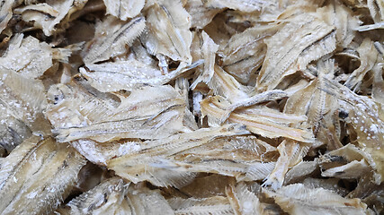 Image showing Small dried fishes for sale 