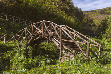 Image showing old weathered wooden bridge