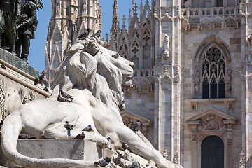 Image showing Lion statue and cathedral in Milan