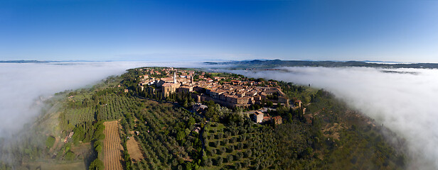 Image showing Old Italian city on top of hill in fog