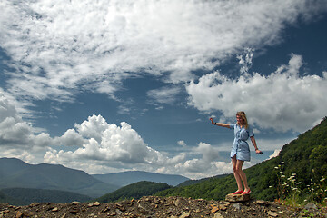 Image showing Happy woman on the mountain