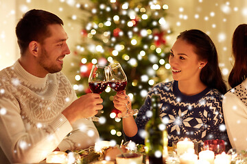 Image showing happy couple celebrating christmas at home feast