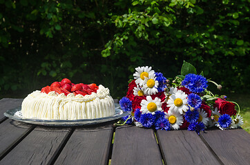 Image showing Cream cake and summer flowers