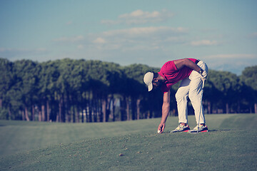 Image showing golf player hitting long shot