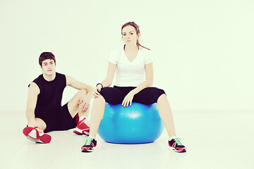 Image showing happy young couple fitness workout and fun