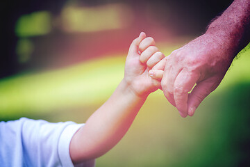 Image showing grandfather and child have fun  in park