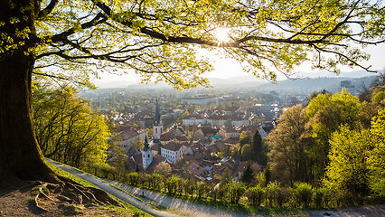 Image showing Panoramic view of Ljubljana, capital of Slovenia. Roooftops of Ljubljanas old medieval city center seen from Ljubljanas castle park at sunset