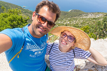 Image showing Beautiful, romantic caucasian couple taking selfie self portrait photo on summer vacations on Adriatic coast of Croatia