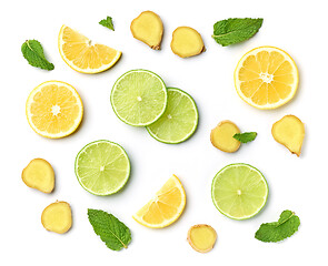 Image showing lime and lemon slices on white background