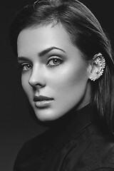 Image showing Beautiful girl with pearls on ear