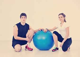 Image showing happy young couple fitness workout and fun