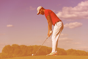 Image showing golf player hitting long shot