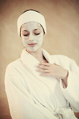 Image showing woman in spa  with cosmetic mask