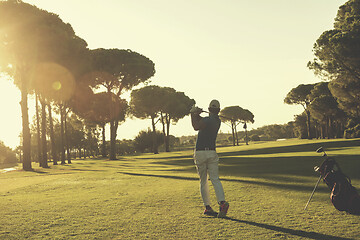 Image showing golf player hitting long shot