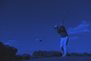 Image showing golf player hitting long shot