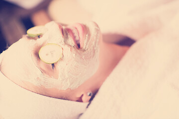 Image showing woman in spa  with cosmetic mask