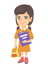 Image showing Caucasian pupil with backpack and textbook.