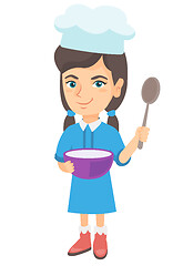 Image showing Caucasian girl holding a saucepan and a spoon.