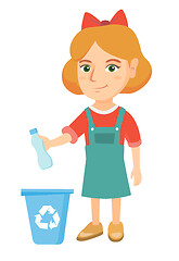 Image showing Girl throwing plastic bottle in recycle bin.