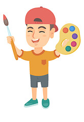 Image showing Happy boy drawing with colorful paints and brush.