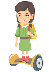 Image showing Caucasian schoolgirl riding on gyroboard to school