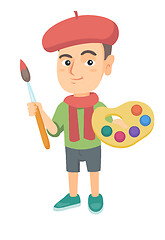 Image showing Boy dressed as an artist holding brush and paints.