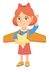 Image showing Caucasian girl with airplane wings behind her back