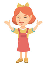 Image showing Happy caucasian girl standing with raised hands.