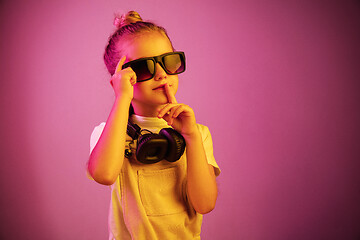 Image showing Young girl with headphones enjoying music