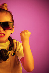 Image showing Young girl with headphones enjoying music