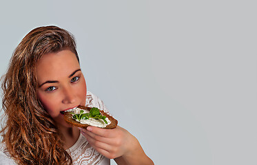 Image showing Woman eats vegan and healthy