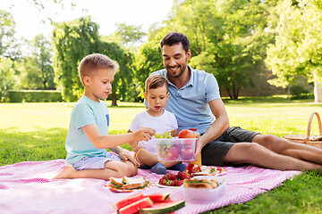 Image showing happy family having picnic at summer park