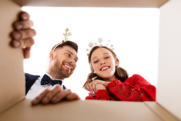 Image showing happy couple opening christmas gift box