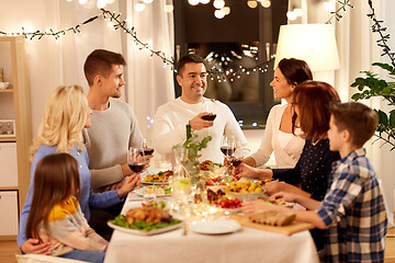 Image showing happy family having dinner party at home