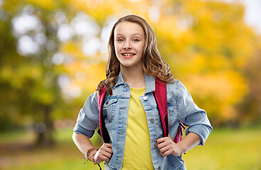 Image showing happy smiling teenage student girl with school bag