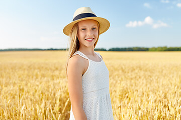 Image showing portrait of girl in straw hat on field in summer