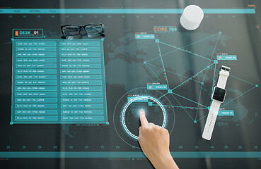 Image showing close up of hand using interactive panel with data