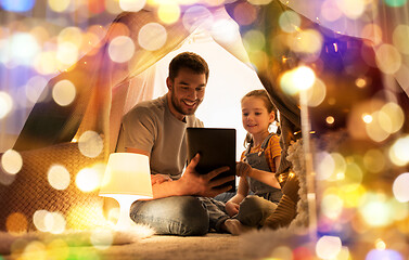 Image showing family with tablet pc in kids tent at home