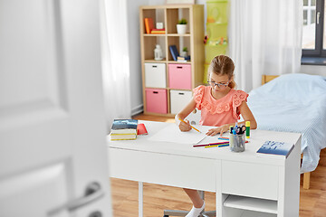 Image showing student girl drawing with pencil at home