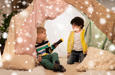 Image showing happy boys with torch light in kids tent at home