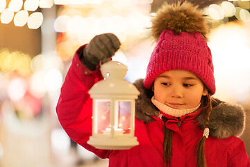 Image showing happy little girl at christmas with lantern market