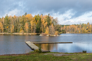 Image showing Beautiful fall colors by a small lake