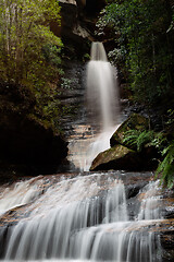 Image showing Wonderful waterfall flowing from canyon into gorge